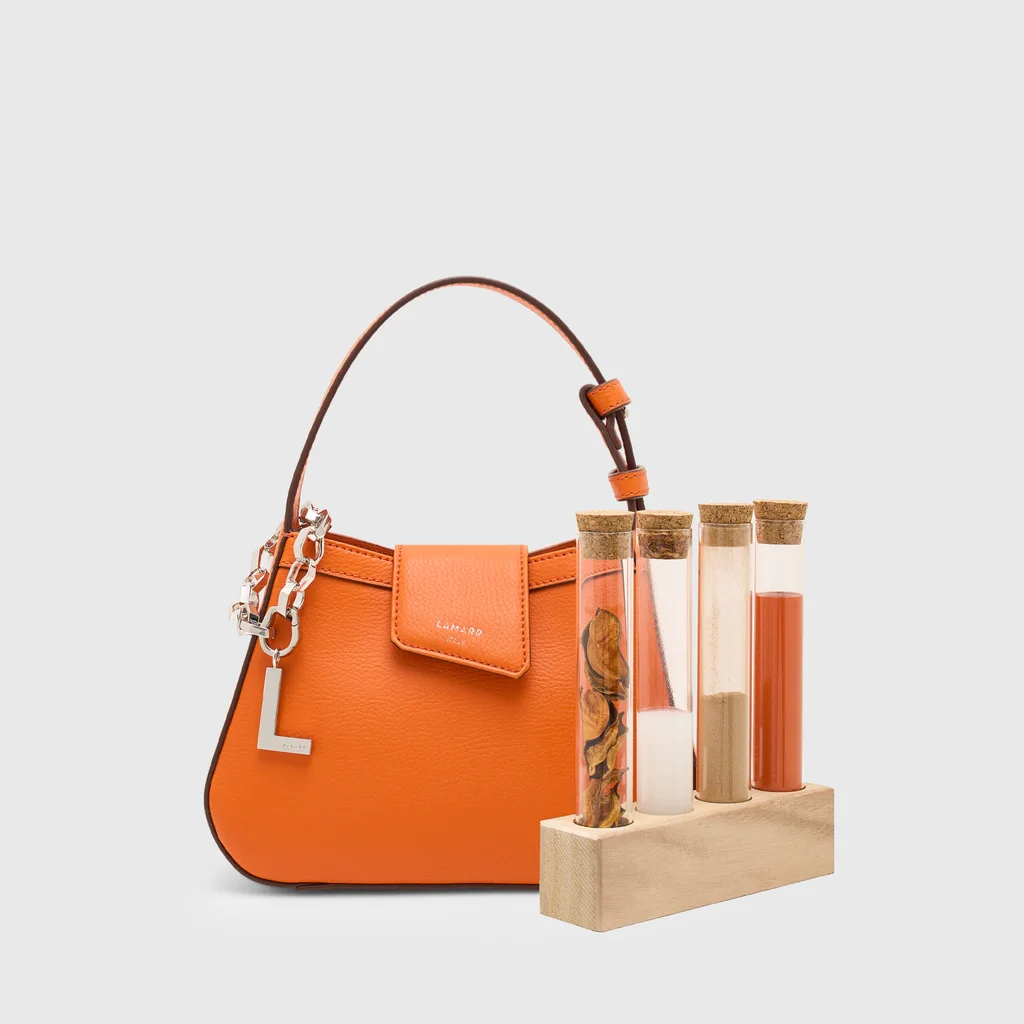 Sustainable luxury handbags by Lamarr x Ohoskin crafted with eco-friendly materials.